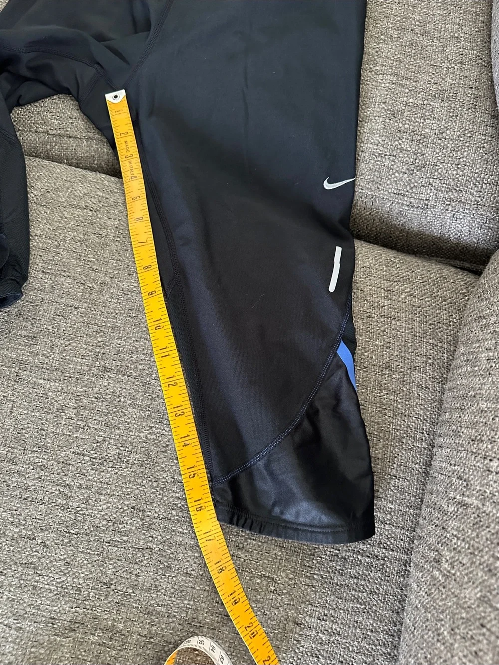 Nike Black Capri Leggings with Blue Trim and White Swoosh Back Zip Pocket Capri